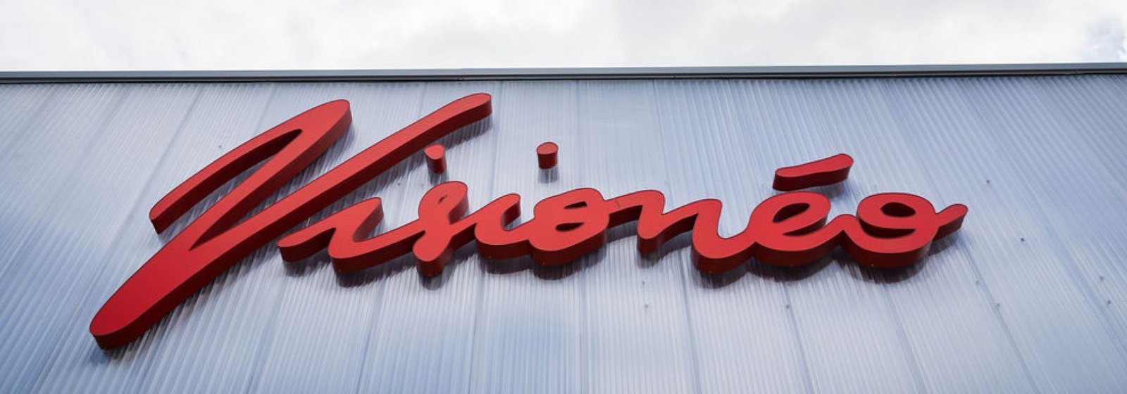 Enseigne script rouge lumineuse fabriquée par Agen Néon
